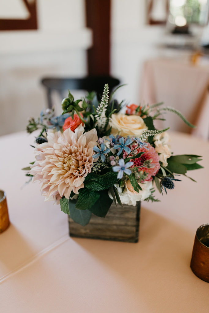 Small Floral Arrangement at Cocktail hour in the barn at Mission Ranch in Carmel