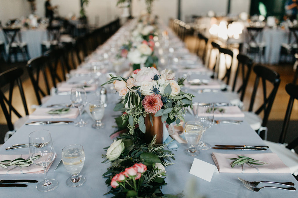 Head table at wedding reception at Mission Ranch in Carmel