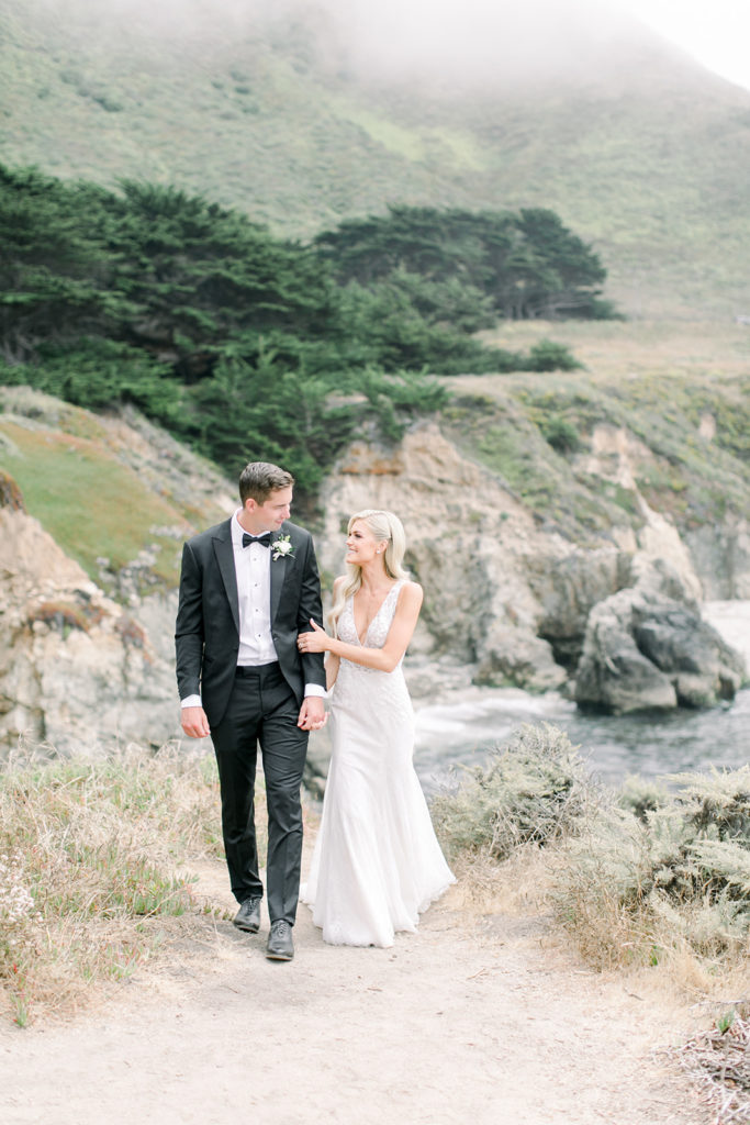 Couple walking along the path in Big Sur 