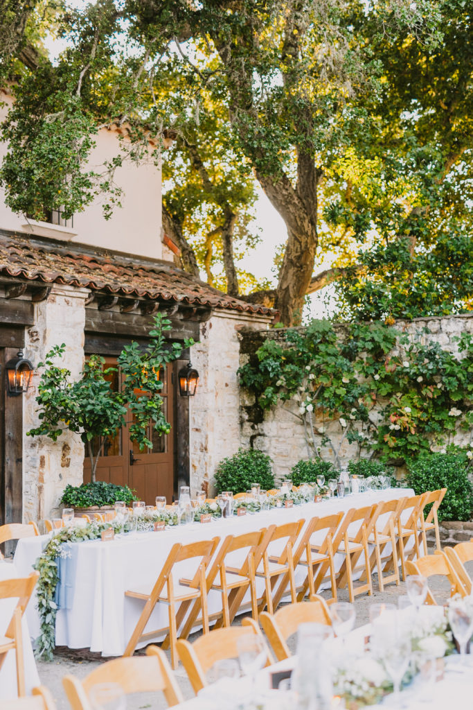 Dinner tables set for guests in the Rose patio