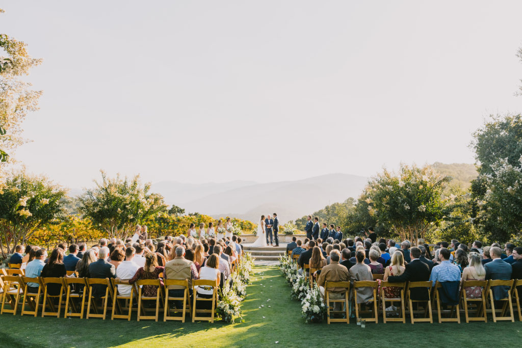 Outdoor wedding ceremony with over 150 guests at Holman Ranch