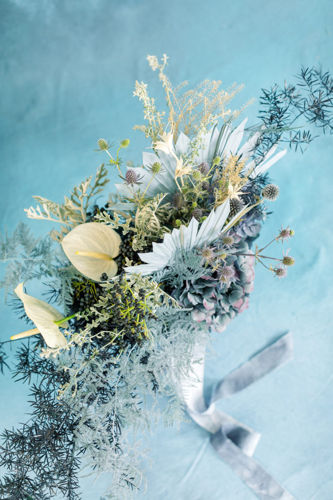 French and dusty blue bridal bouquet