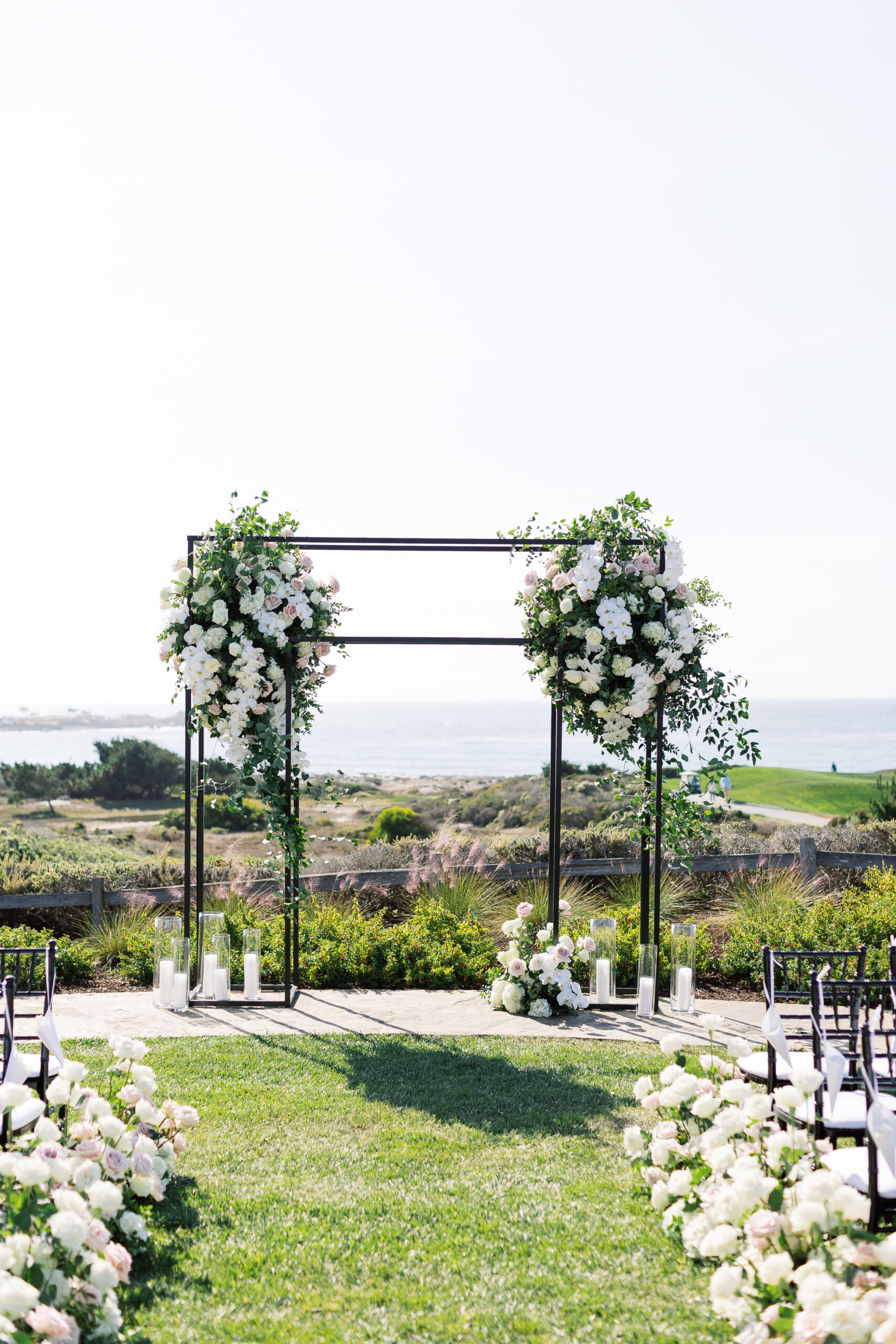 Wedding ceremony on Peppoli Lawn at the Inn at Spanish Bay a Pebble Beach Resort.